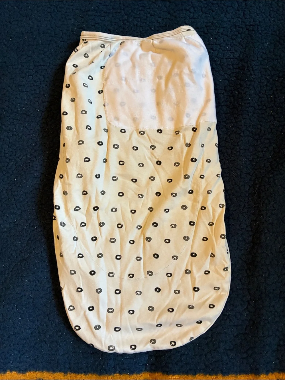 Nested Bean Cream Swaddle with Black Dot Accent